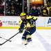 Michigan senior center A.J. Treais passes the puck in the game against Michigan State at Joe Louis Arena on Saturday, Feb. 2. Daniel Brenner I AnnArbor.com